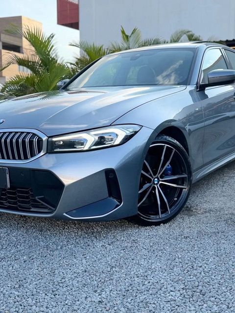 BMW 320i na cor cinza, vista dianteira em três quartos (foto 4 de 16)