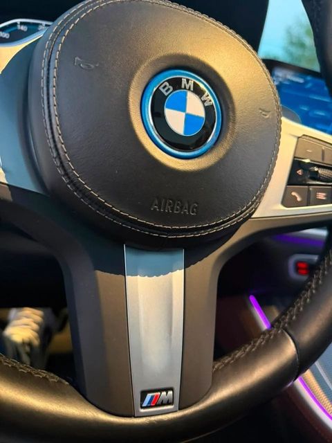BMW X5, volante e quadro de instrumentos