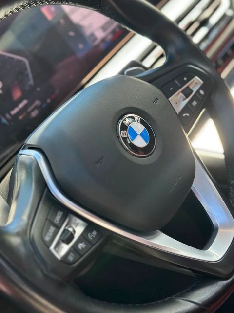 BMW 320i, volante e quadro de instrumentos (foto 11 de 20)